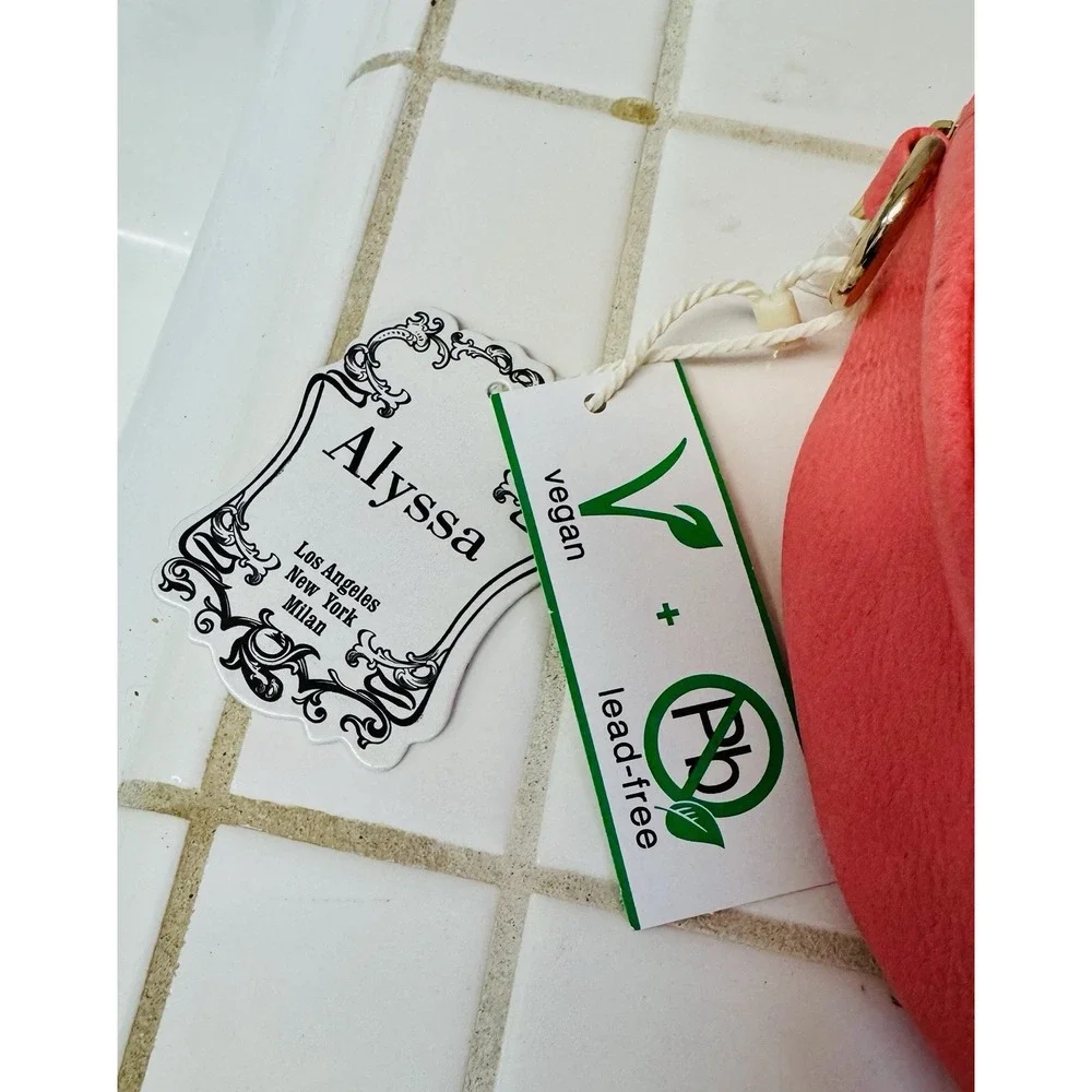 Alyssa Vegan Orange Small RoundPurse Bag with Tassels & Grommets Crossbody Strap - Picture 4 of 5